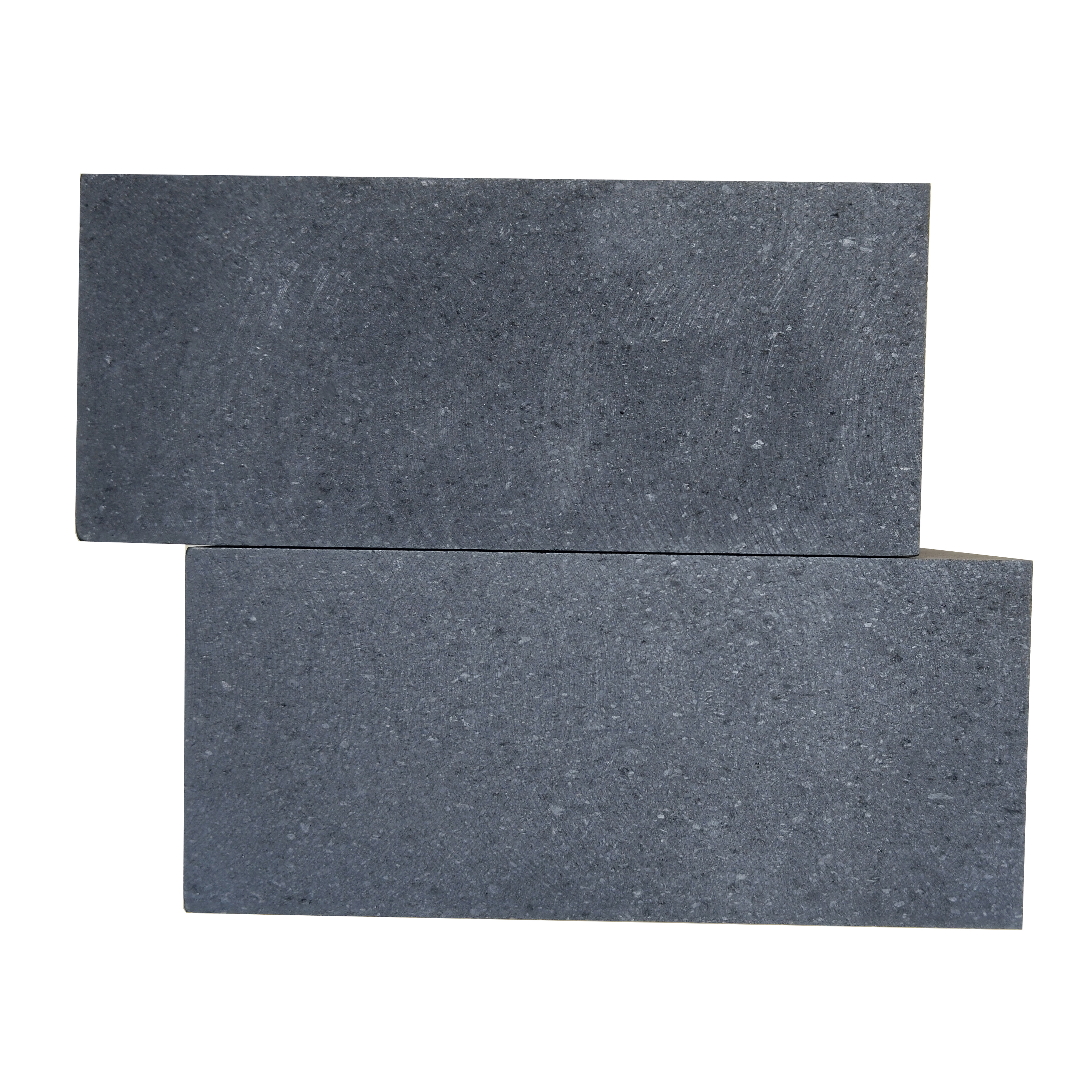 Primer plano de la superficie de un bloque de grafito de grano medio que muestra una textura natural de part&iacute;culas de 0,8 mm y una estructura moldeada por vibraci&oacute;n uniforme, densidad de 1,72 g/cm&sup3; para aplicaciones de moldes de fundici&oacute;n