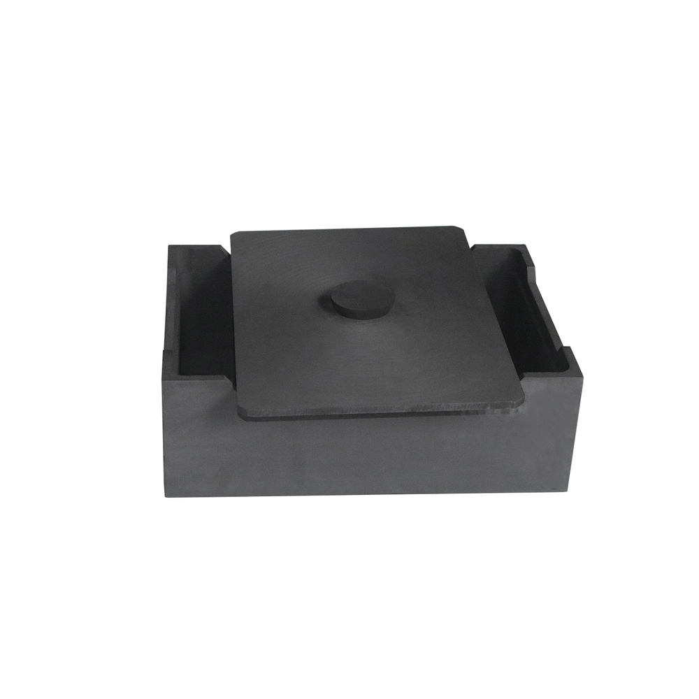 Caja sagger de grafito con tapa abierta que muestra una cavidad interna profunda y superficies mecanizadas lisas dise&ntilde;adas para aplicaciones de sinterizaci&oacute;n de pulvimetalurgia.