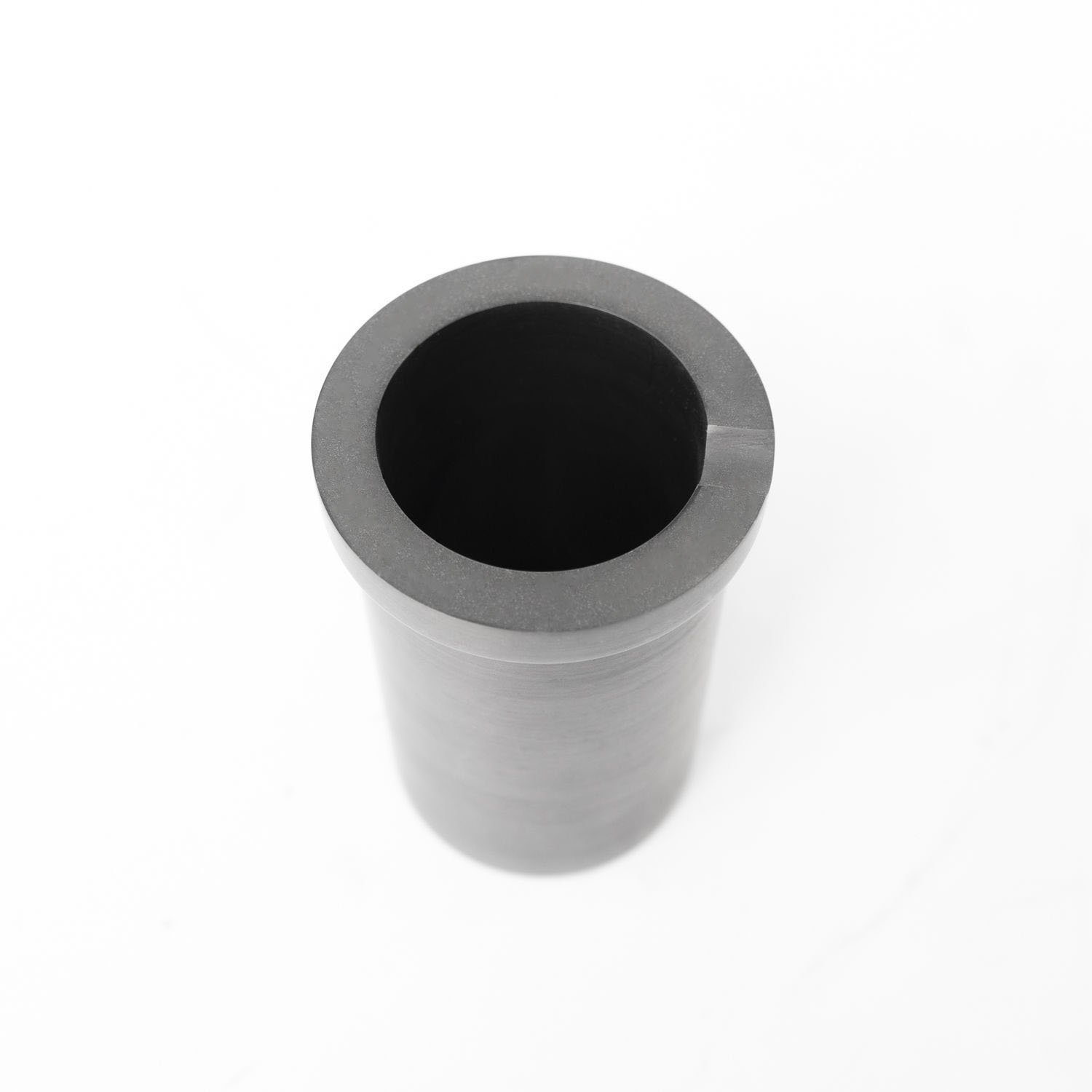 Vista superior del crisol de grafito de un solo anillo de alta pureza que muestra el labio del anillo reforzado y una pared interior lisa para aplicaciones de fusi&oacute;n de oro y plata.